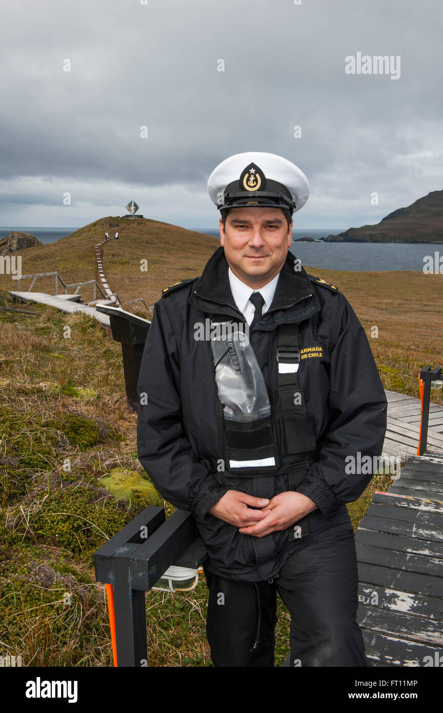 Armada de Chile officer at entrance to pathway leading to Albatros monument, Cabo de Hornos National Park, Magallanes y la Antartica Chilena Region, Patagonia, Chile Stock Photo