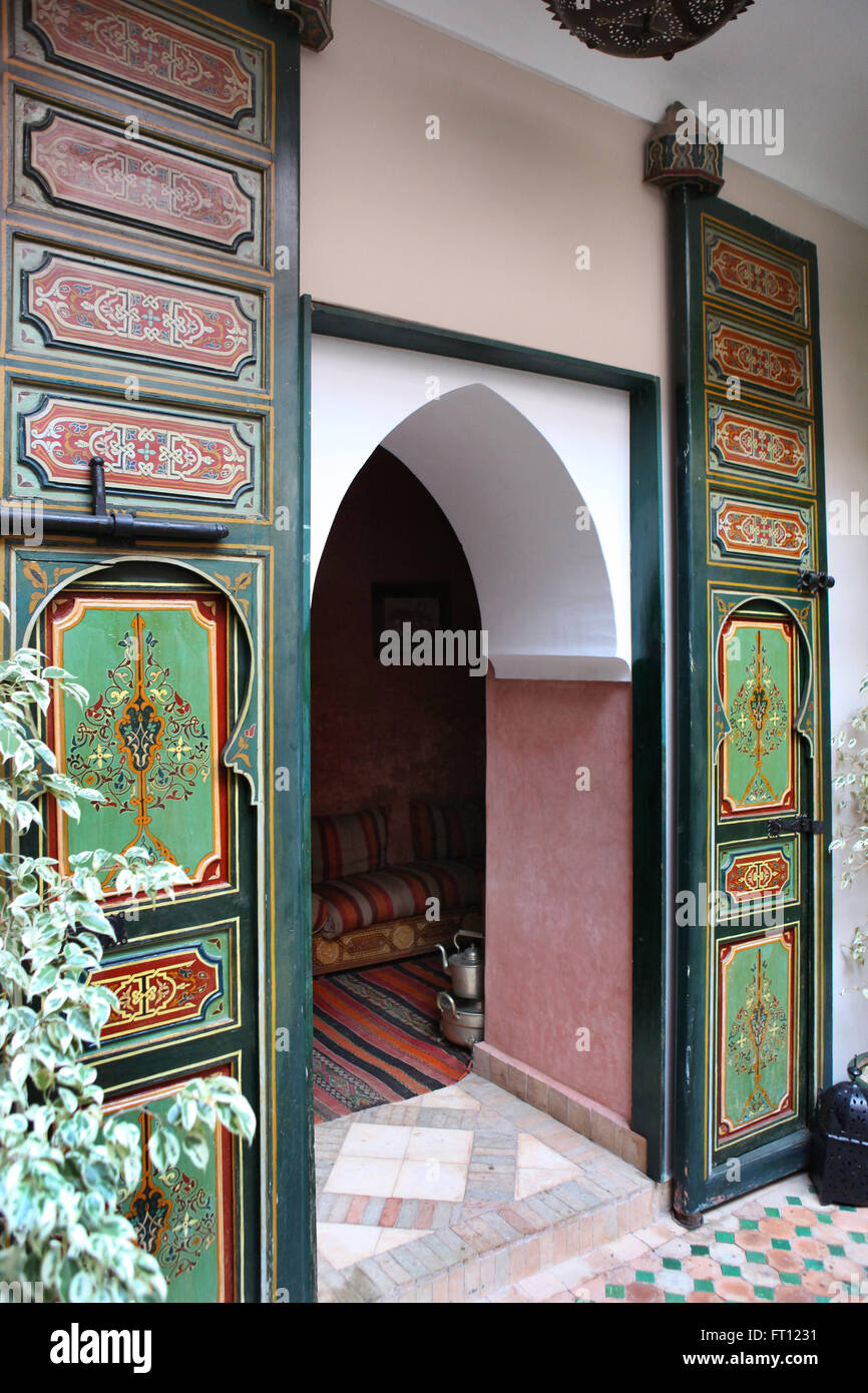 Painted door inside a riad, Marrakech, Morocco Stock Photo