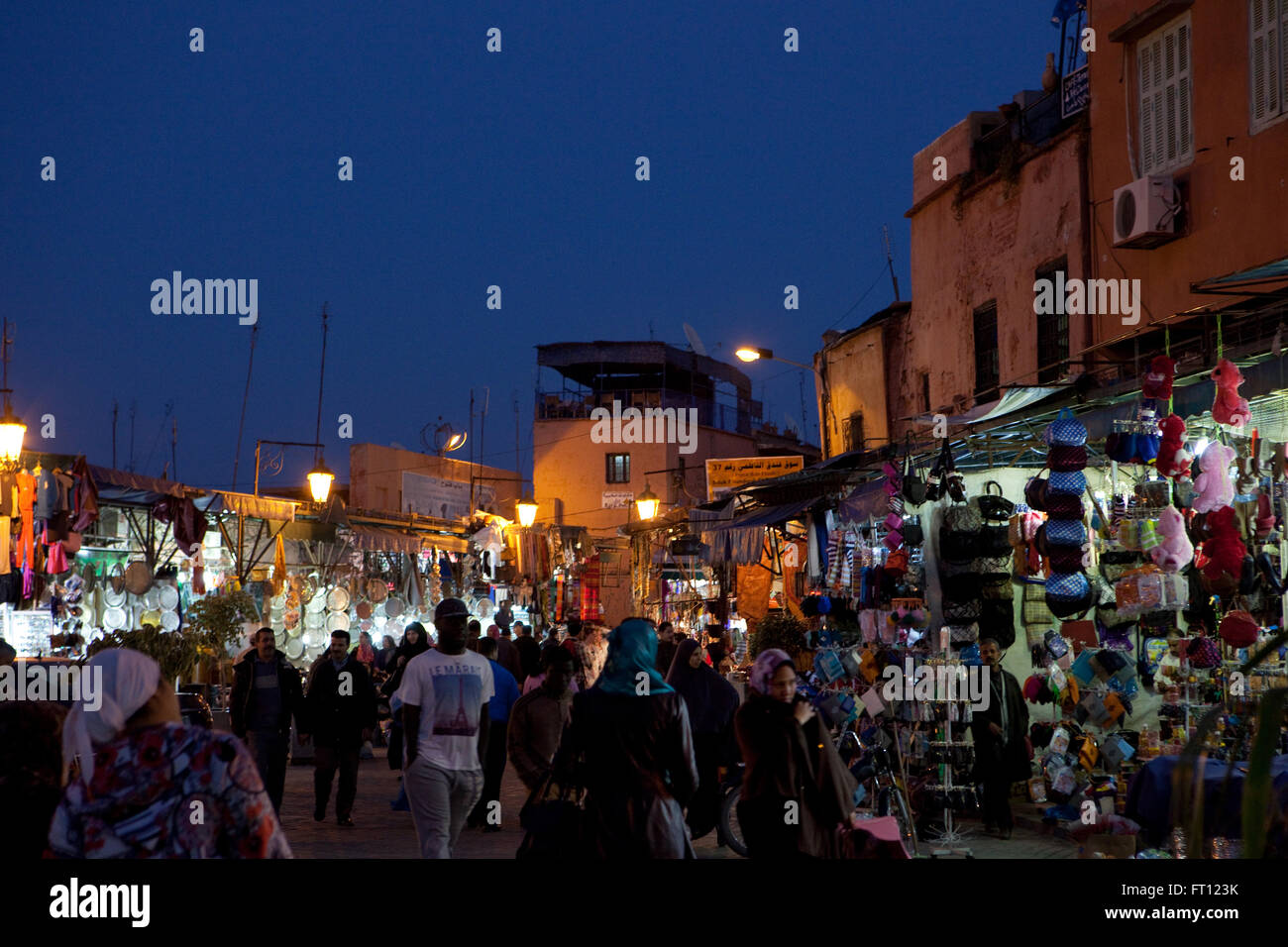 lively scene in the souk at night, Marrakech, Morocco Stock Photo
