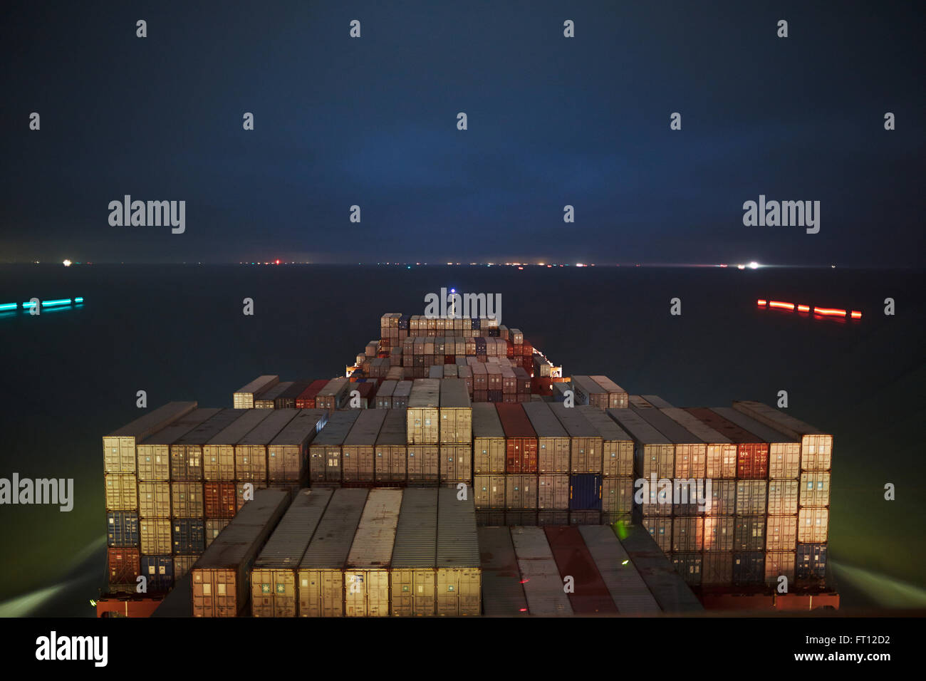 Container ship at night hires stock photography and images Alamy
