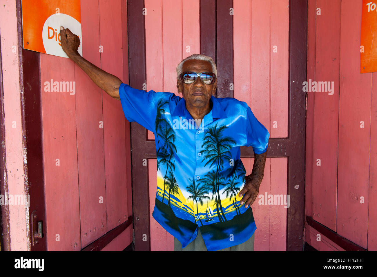 Cool man wearing a tropical shirt, Levuka, Ovalau island, Fiji, South Pacific Stock Photo