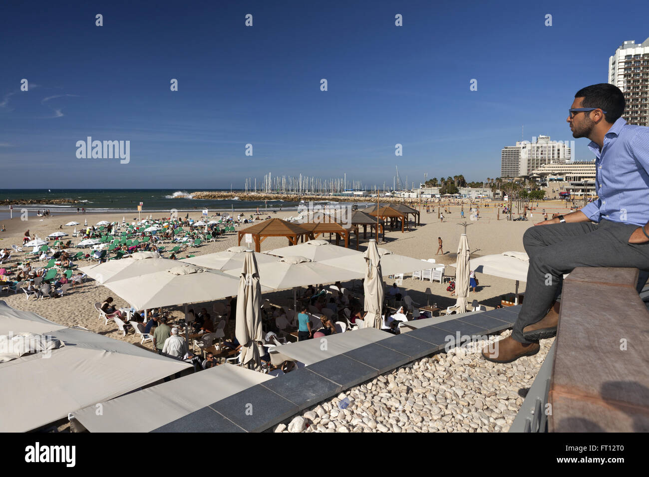 Man looking out to the Mediterannean over the beaches of Tel-Aviv, Israel, Asia Stock Photo