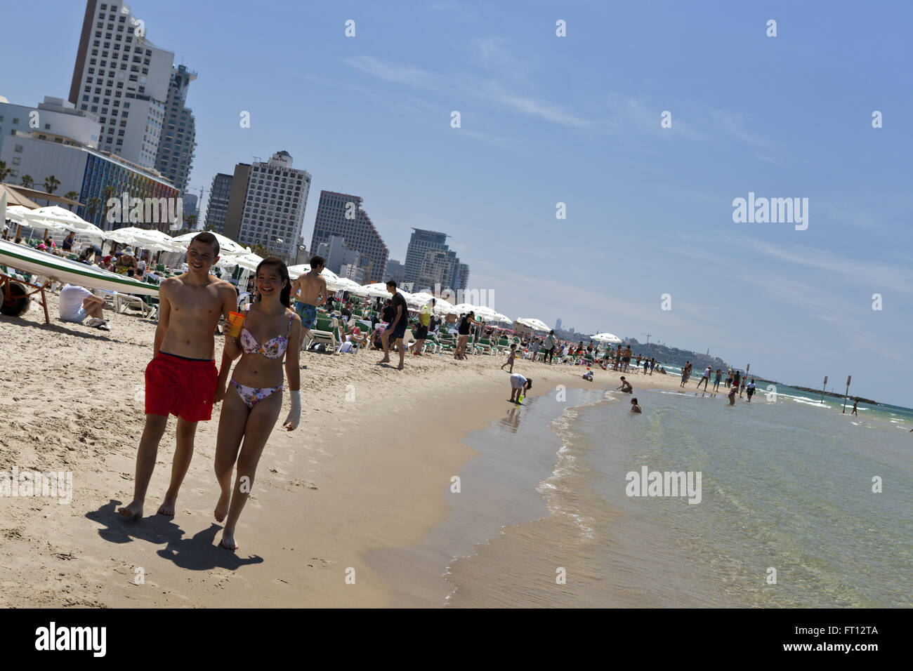 Young couple strolling on the beaches of Tel-Aviv, Israel, Asia Stock Photo