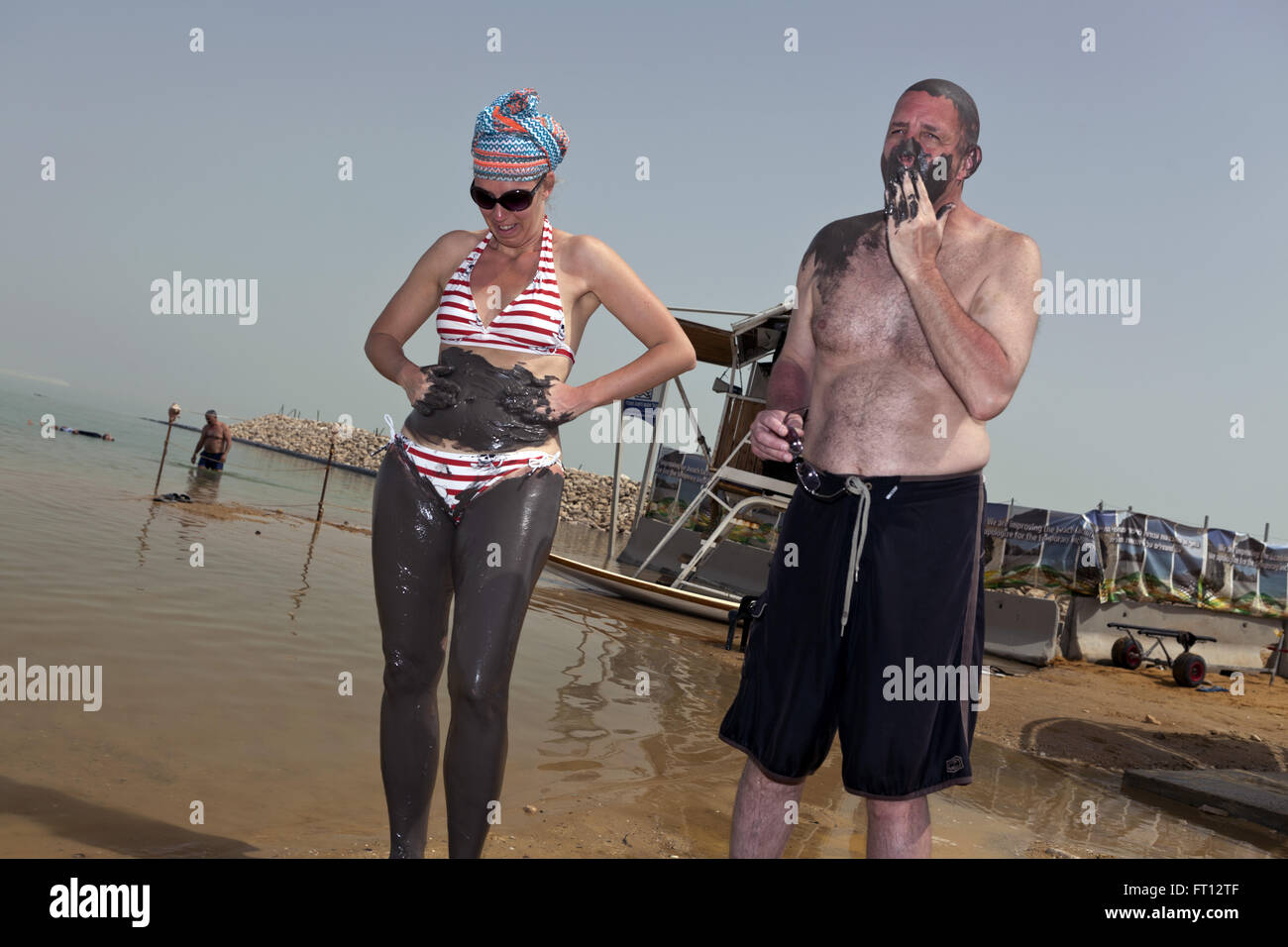 Applying mineral mud at the Dead Sea, En Bokek, Israel, Asia Stock Photo