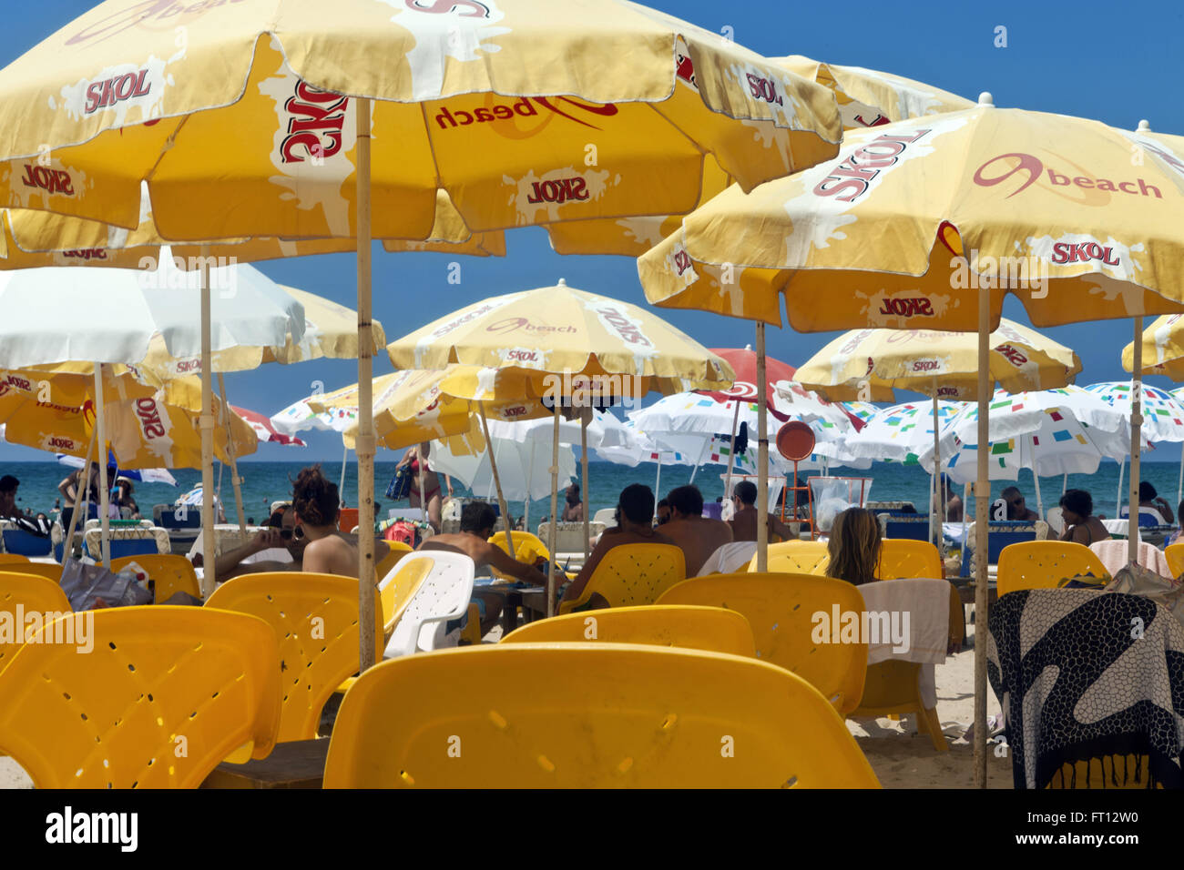 Yellow beach chairs and umbrellas on the beaches of Tel-Aviv, Israel, Asia Stock Photo