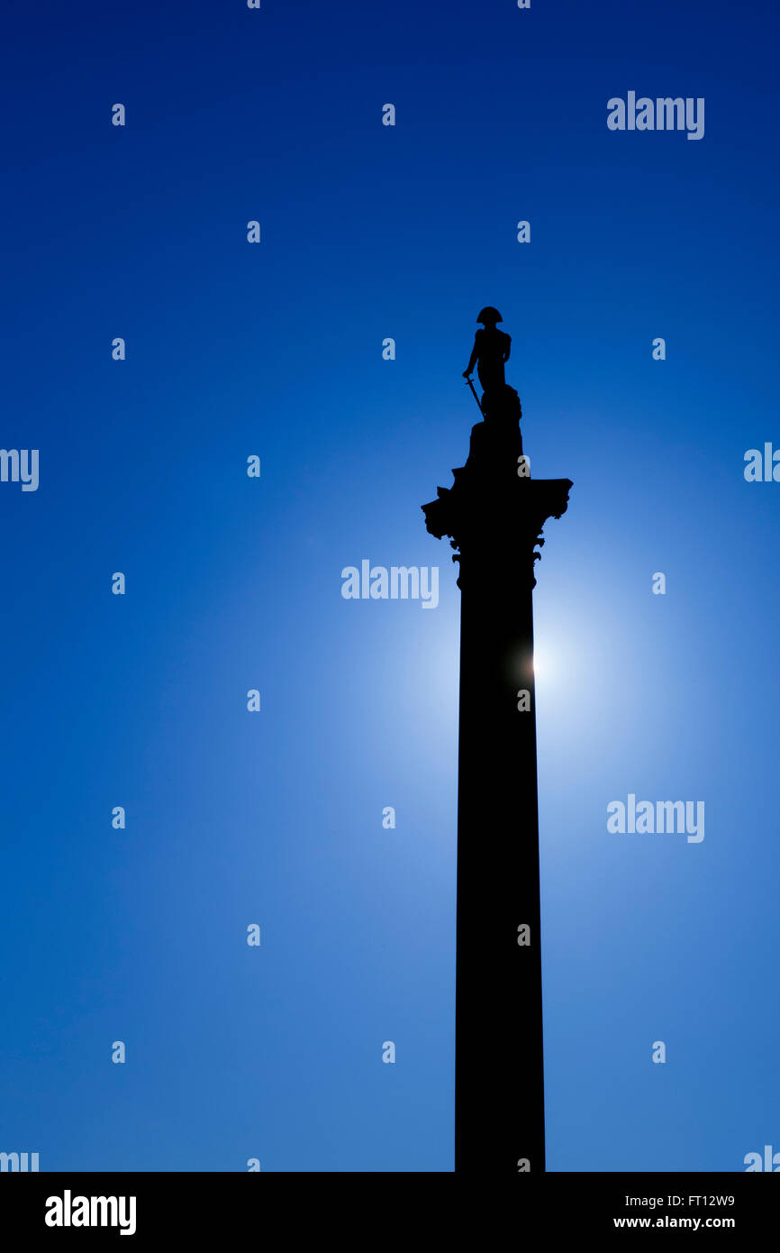 Nelson's Column against sun and blue sky, Trafalgar Square, London, England, UK, GB, Europe Stock Photo