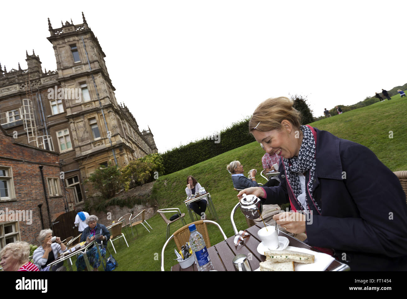 Woman enjoying tea at Highclere Castle, TVs Downton Abbey, Newbury, West Berkshire, England, United Kingdom Stock Photo