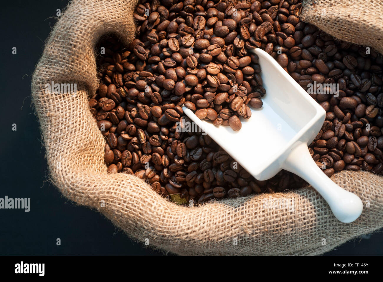 Coffee beans in a gunnysack Stock Photo