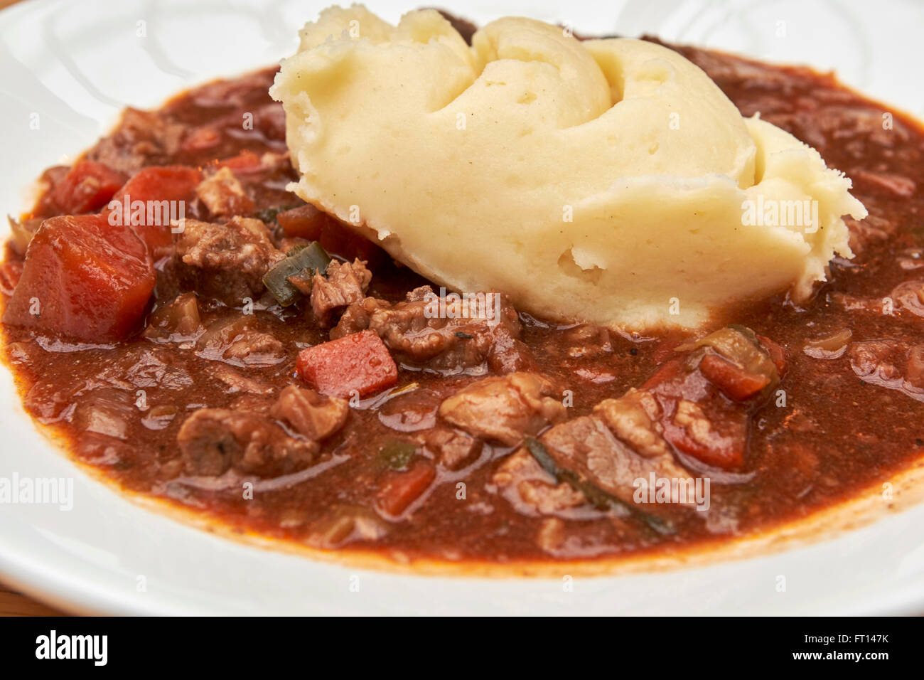 plate of beef and guinness irish stew topped with mash potato dublin Ireland Stock Photo