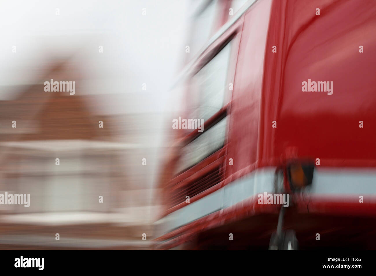 A blurred image of a london buss passing by on its journey through the capital city. Stock Photo