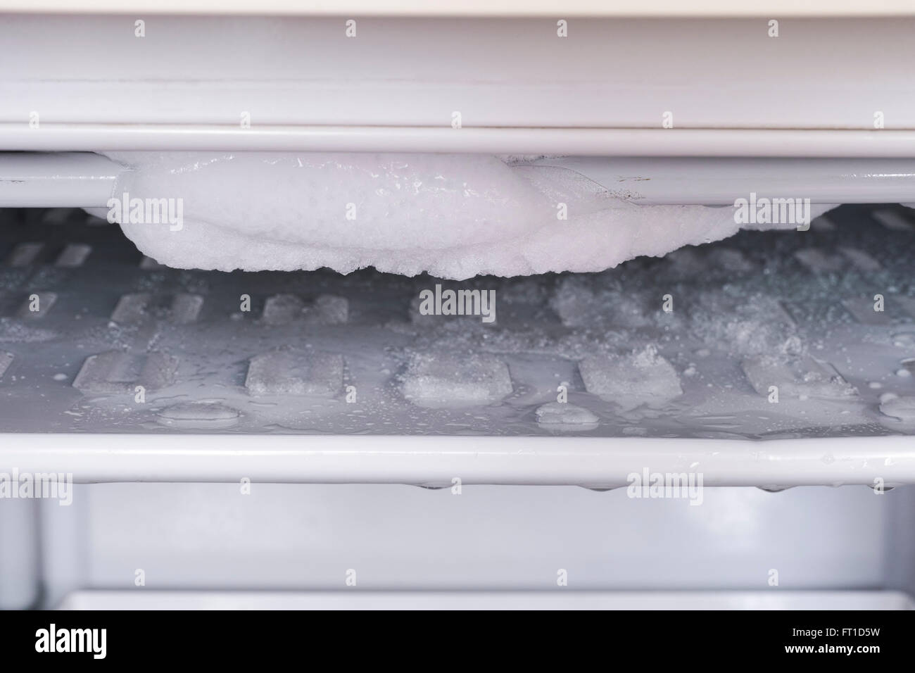 Ice in freezer. Close up. Stock Photo