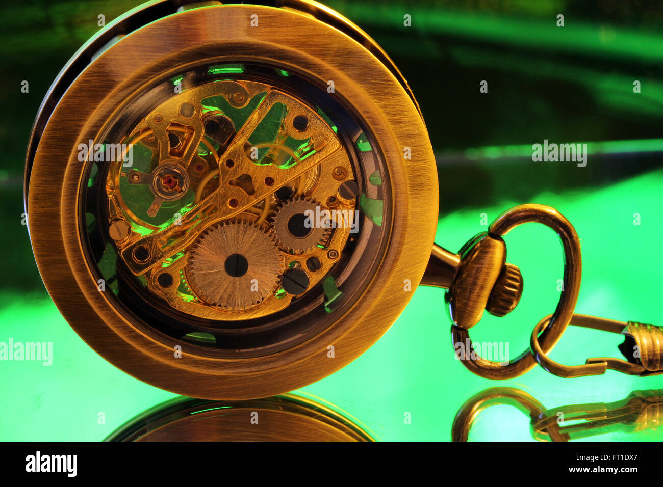 The inner gears of a pocket watch. Stock Photo