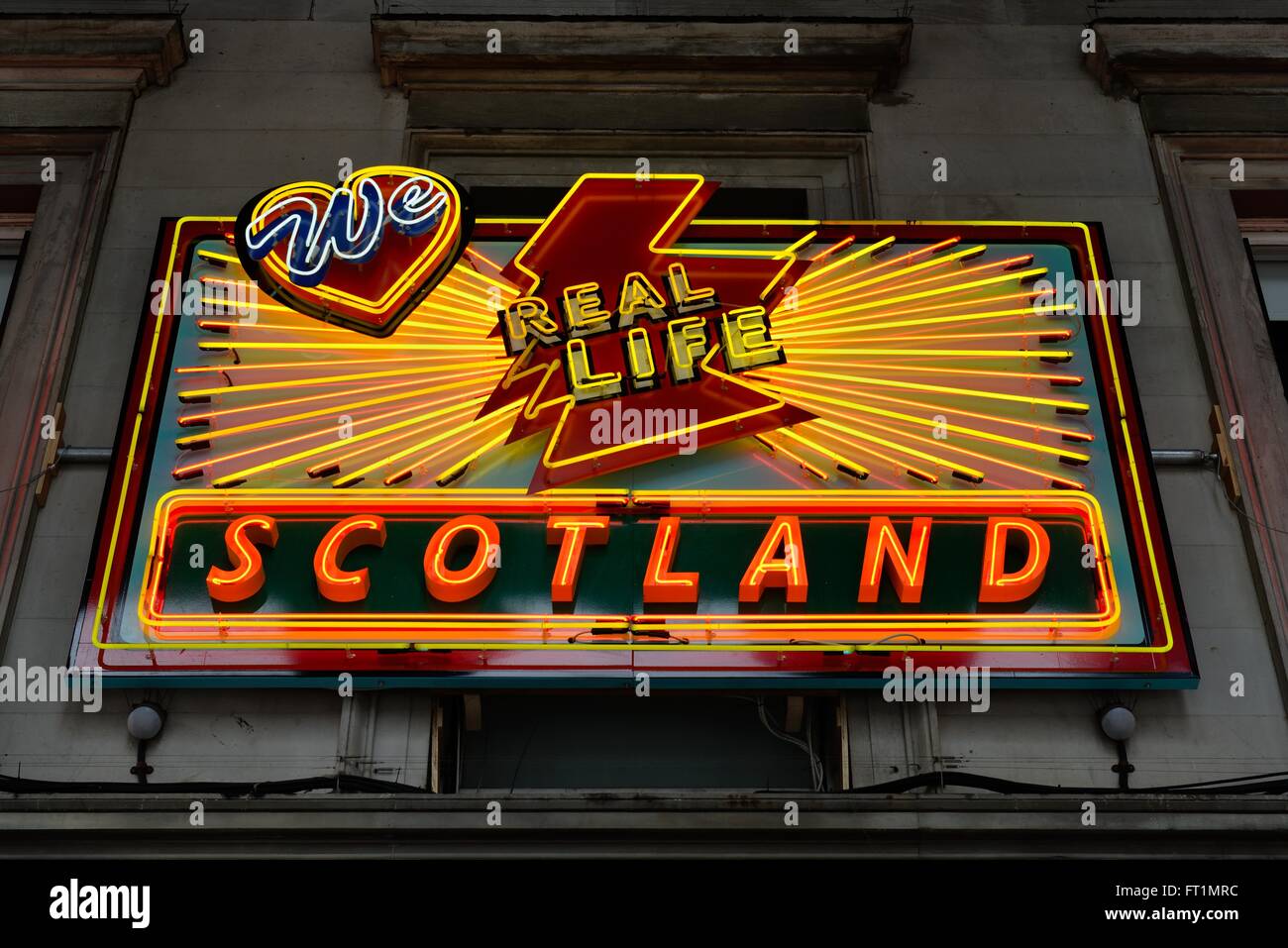 We love real life Scotland neon light on the Glasgow Gallery of Modern Art in Scotland, UK Stock Photo