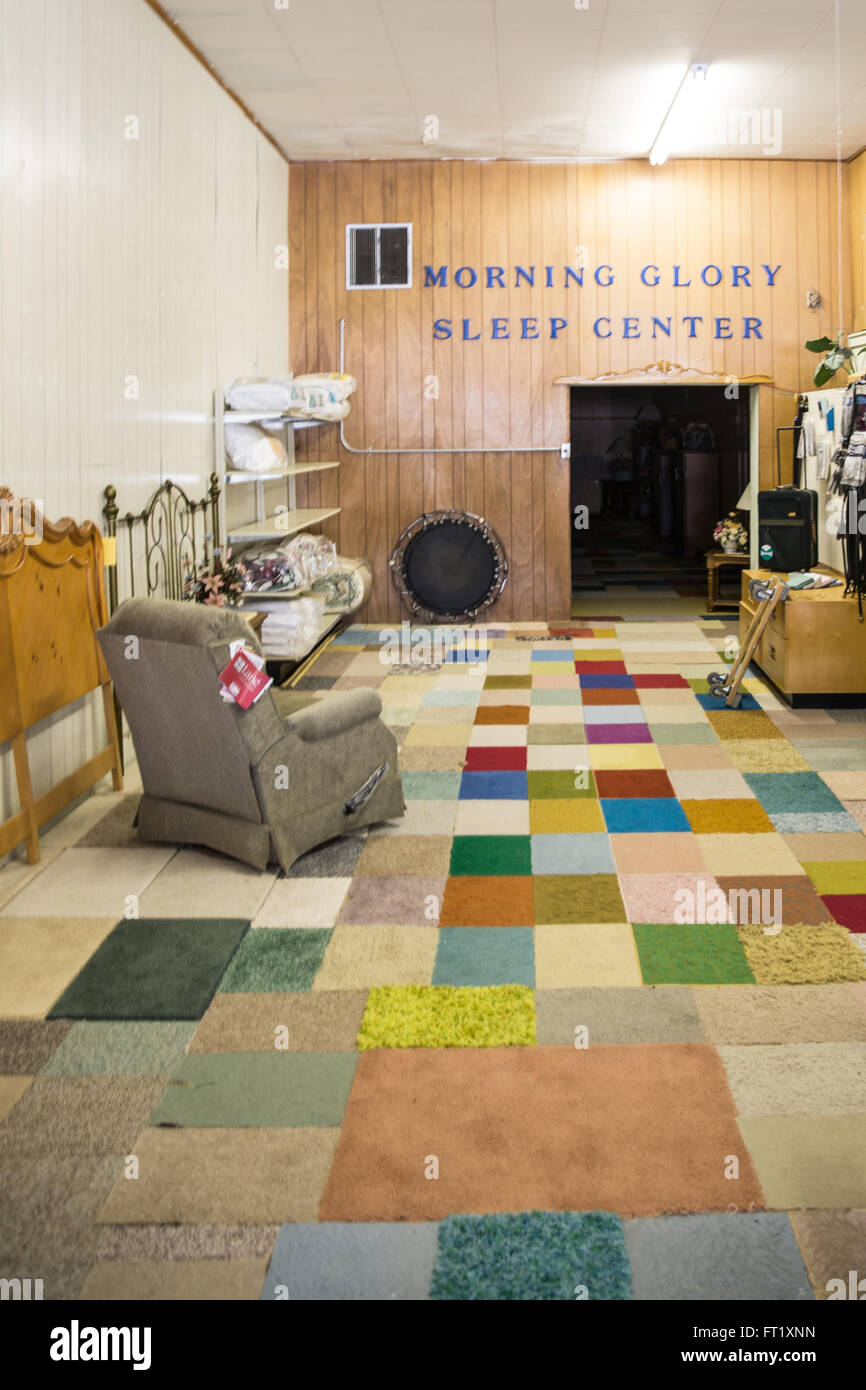 thrift store with a patch work rug Stock Photo Alamy