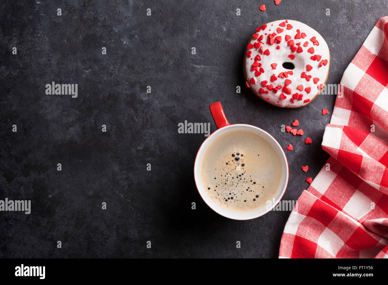 Donut and coffee on stone table. Top view with copy space Stock Photo ...