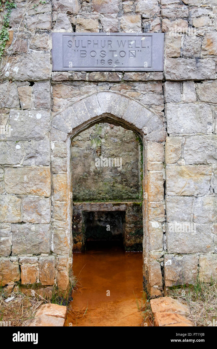 19th century Boston Sulphur Well 1864 is a grade II listed building over a chalybeate spring. Rhos Lligwy Moelfre Anglesey Wales Stock Photo
