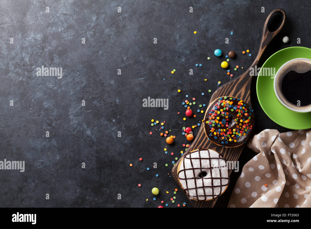 Donuts and coffee on stone table. Top view with copy space Stock Photo ...