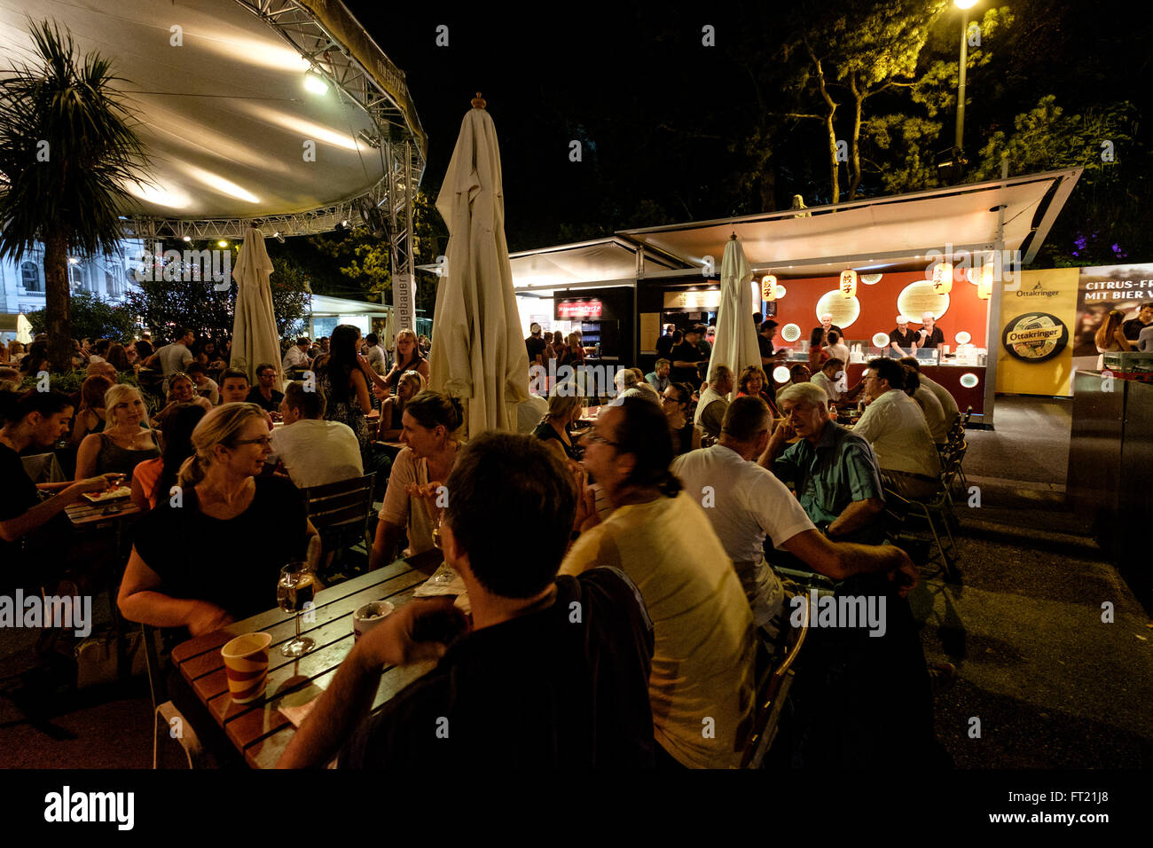 Groups of friends having a drink outside during the Vienna FIlm Festival at Rathausplatz in Vienna, Austria, Europe Stock Photo
