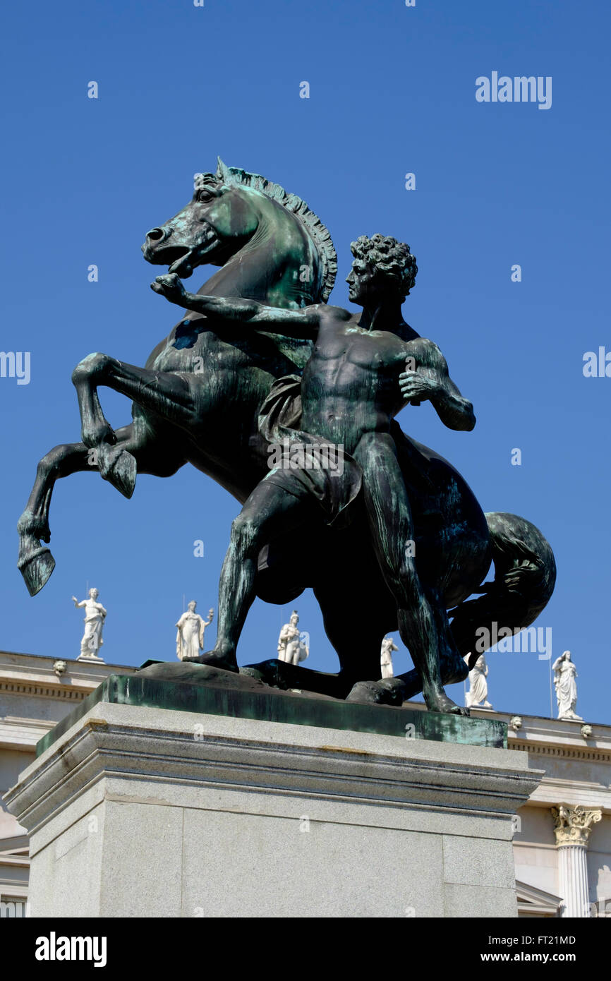 Bronze horse tamer statue at the Austrian Parliament Building in Vienna
