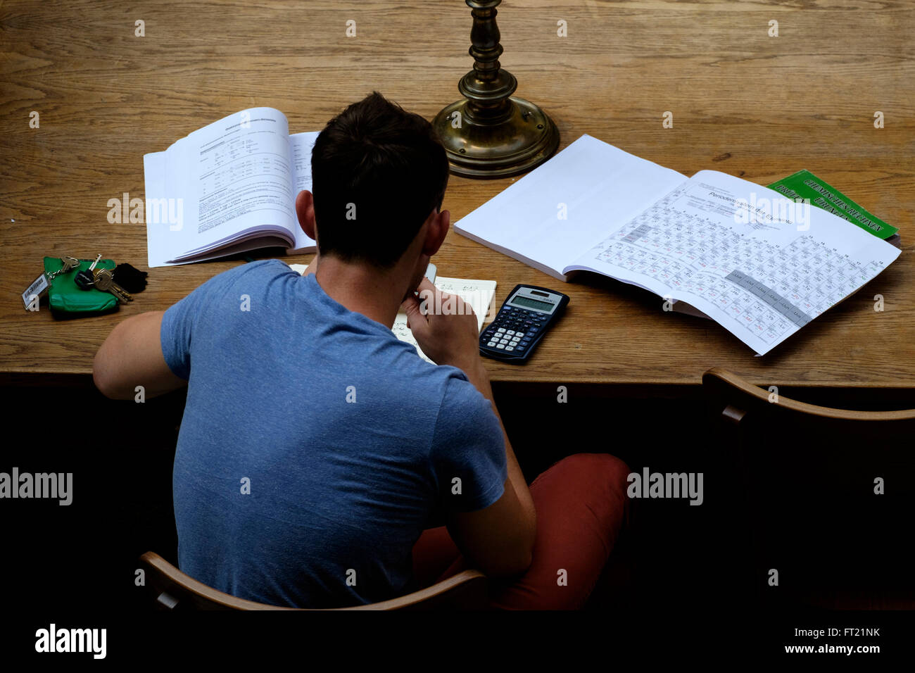 Overhead view of a student studying Stock Photo