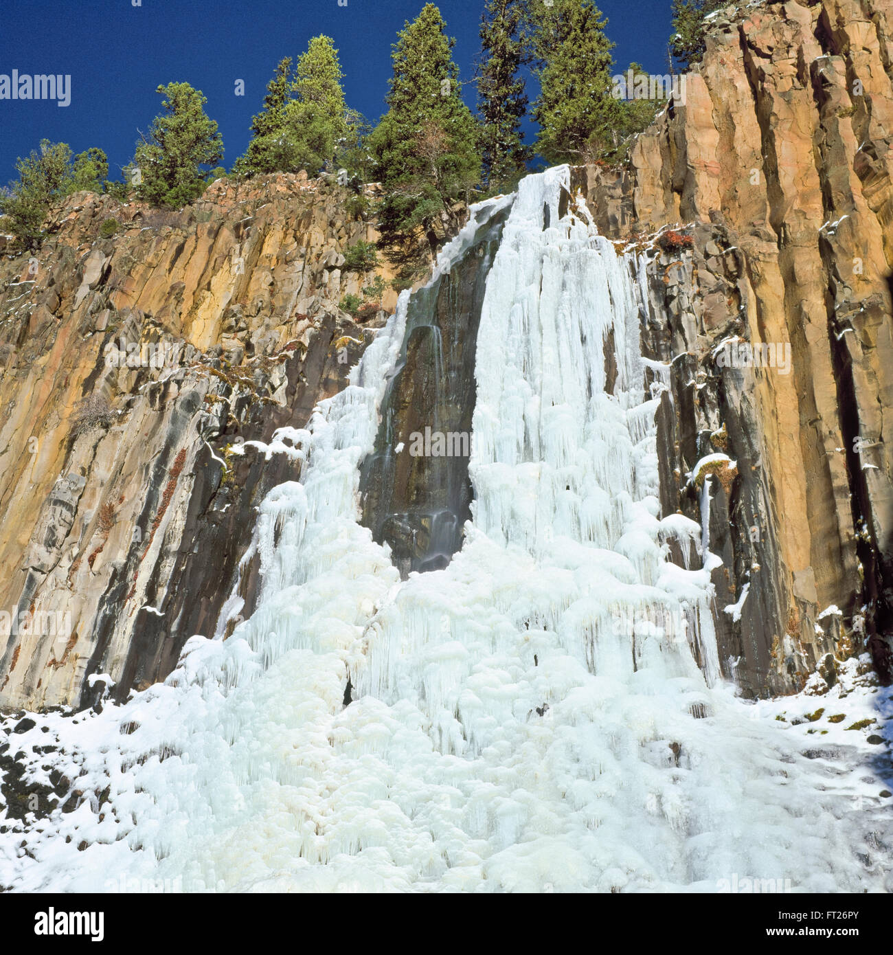 frozen palisade falls in the hyalite creek basin near bozeman, montana