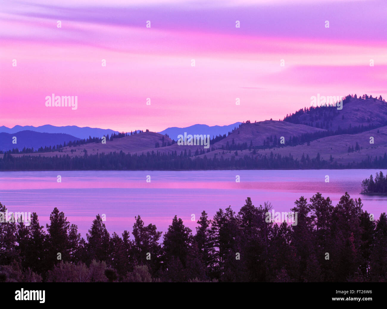 sunrise over flathead lake and wildhorse island near polson, montana