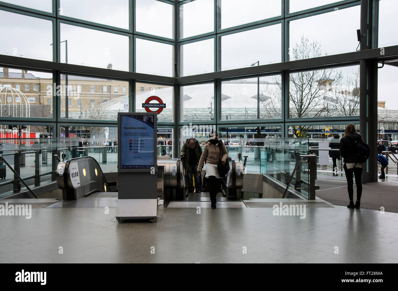 Escalators in the main entrance of St Pancras International Railway Station lead to and from The London Underground. Stock Photo