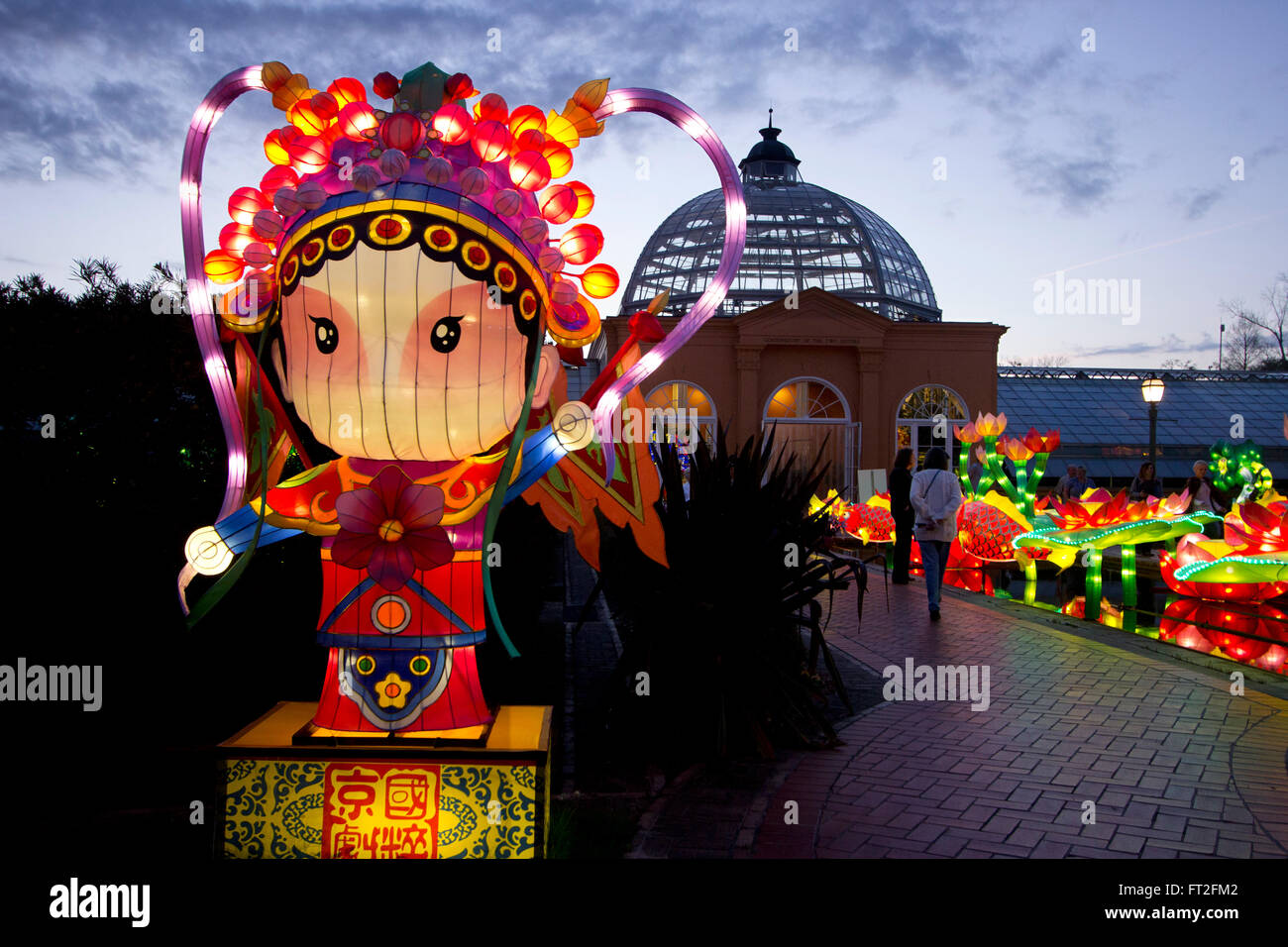 Chinese girl glowing sculpture in the New Orleans botanical garden during the China Lights exhibit at City Park, 2016. Stock Photo