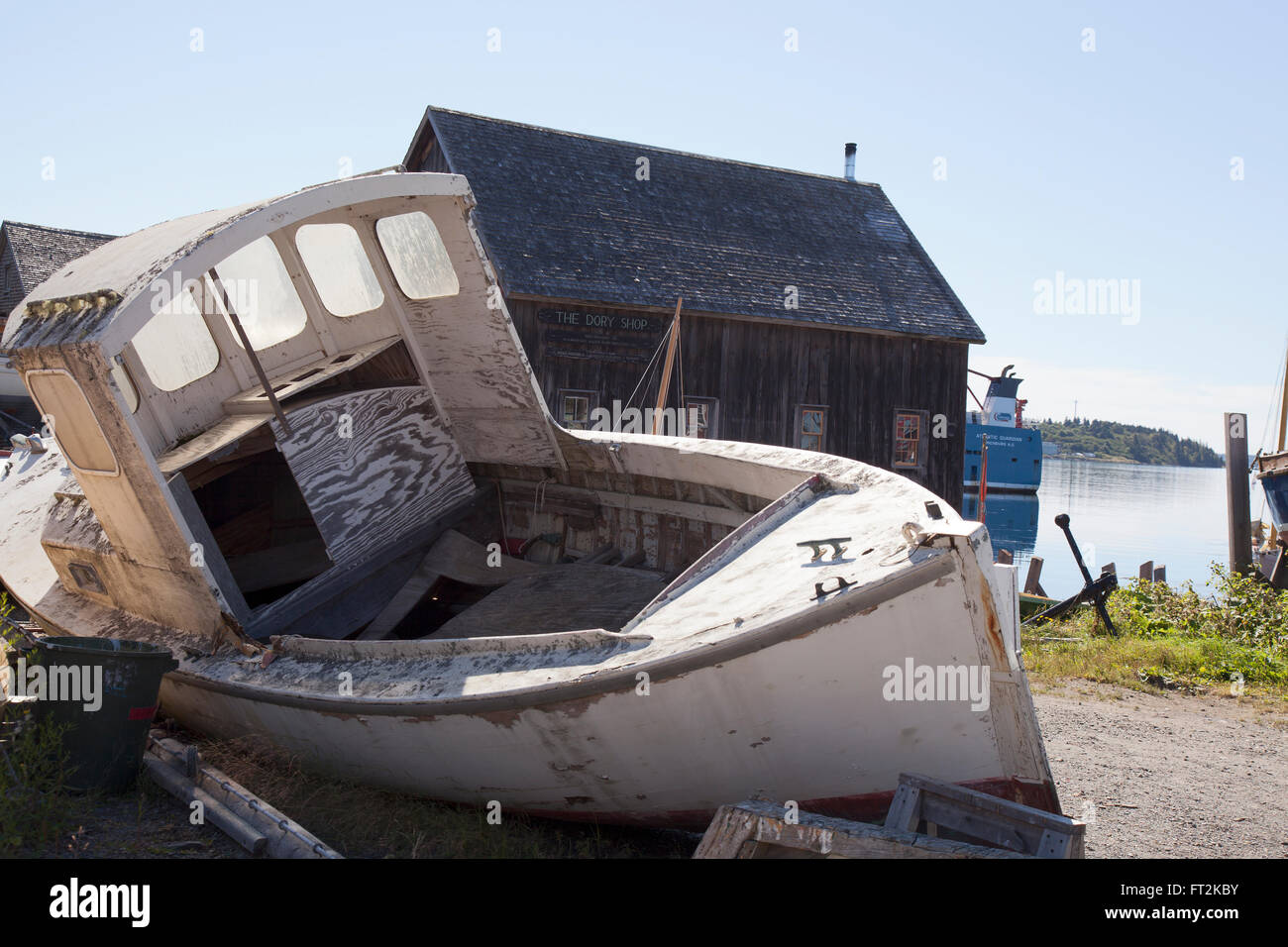 old abandoned boat behind dory shop   lunenburg nova scotia Stock Photo