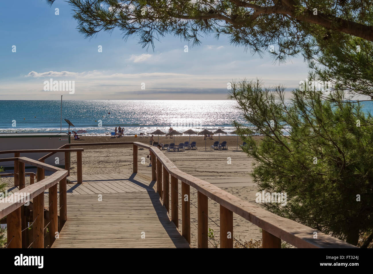 Wooden descent to the beach, Spain Stock Photo