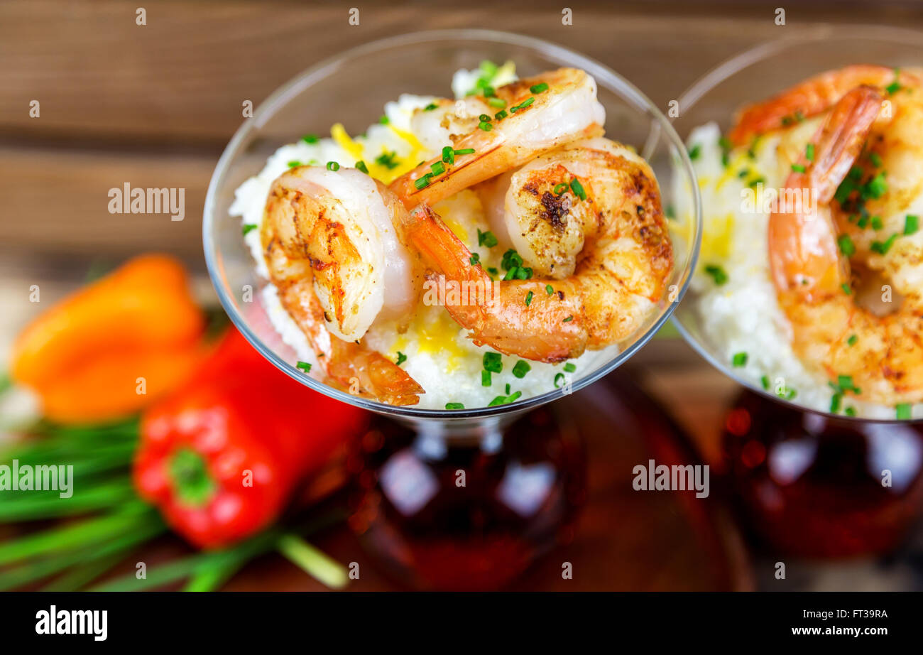 Small serving of shrimp and grits in a martini glass Stock Photo Alamy