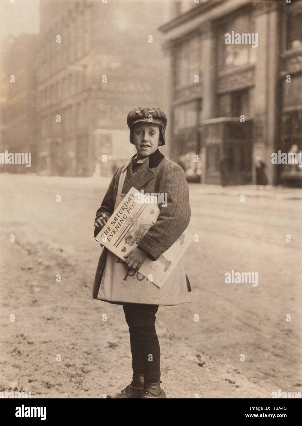 Young boy selling newspapers hires stock photography and images Alamy