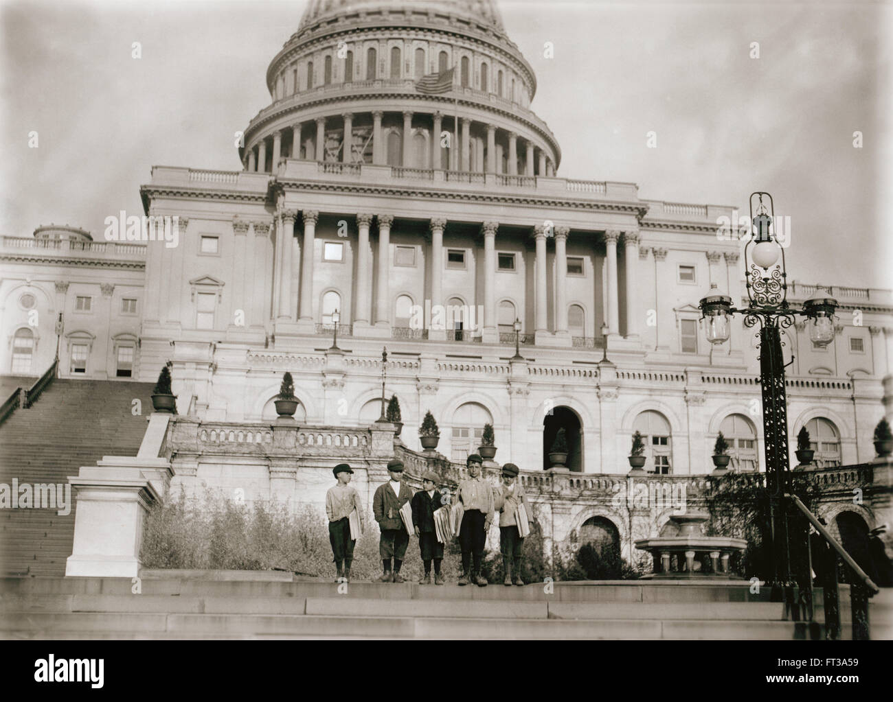 Group of Young Newsboys Selling Newspapers on Steps of U.S. Capitol