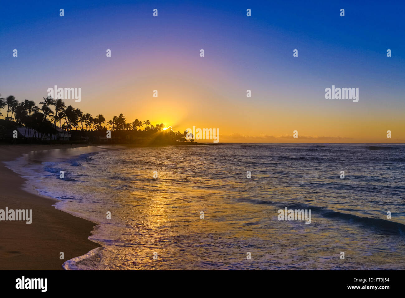 Sunrise over Poipu Beach Kauai Hawaii Stock Photo