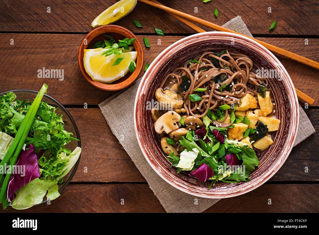 Miso and soba noodle soup with roasted tofu and mushrooms. Top view Stock Photo Alamy