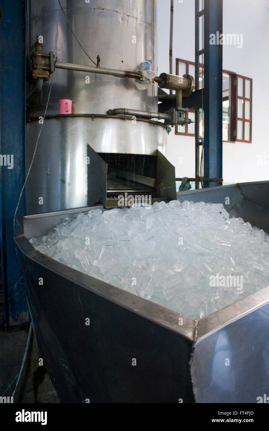 A large ice manufacturing machine is shown at a facility known as the Im Chheng factory in Ou