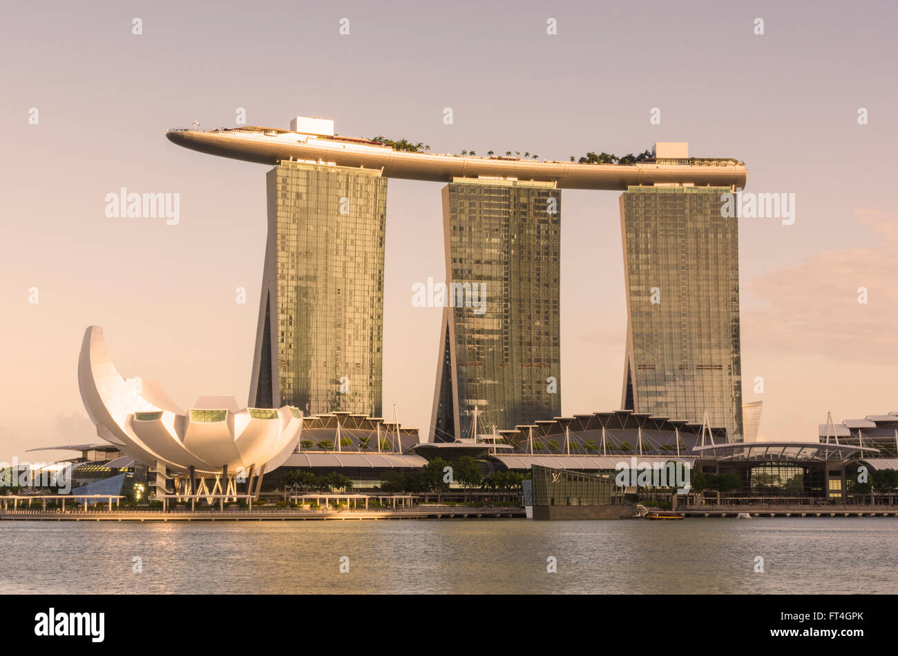Marina Bay Sands Hotel and ArtScience Museum bathed in golden late afternoon sun, Marina Bay, Singapore Stock Photo