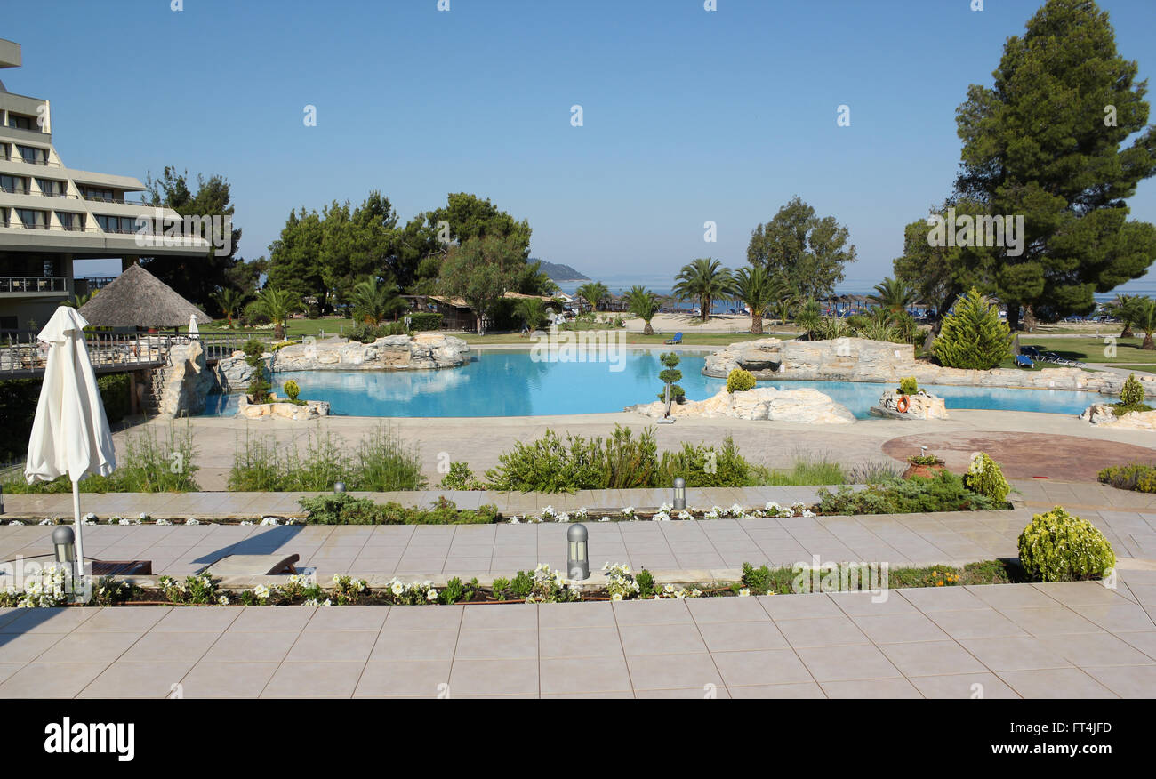 swimming pool with park vacation scene Stock Photo Alamy