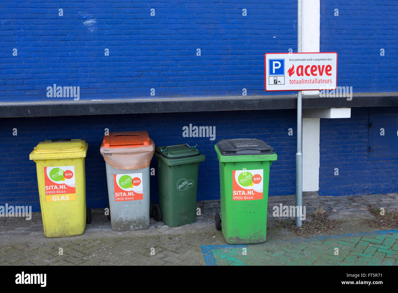 Trash cans at Uit Je Eigen Stad in Rotterdam, the Netherlands. The bis
