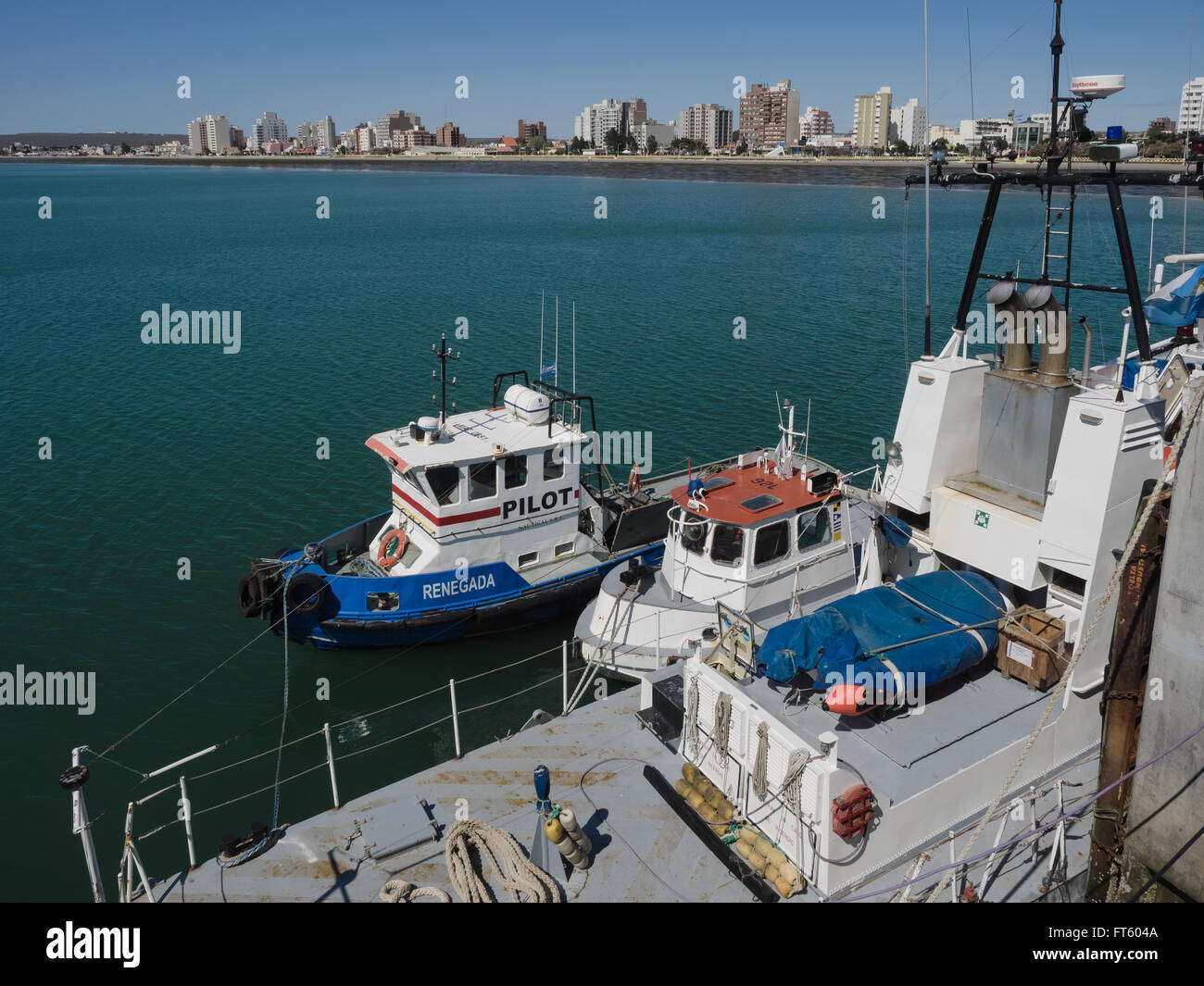 Puerto Madryn, Argentina - 26th October 2015: Boats tied at the pier in spring. Stock Photo