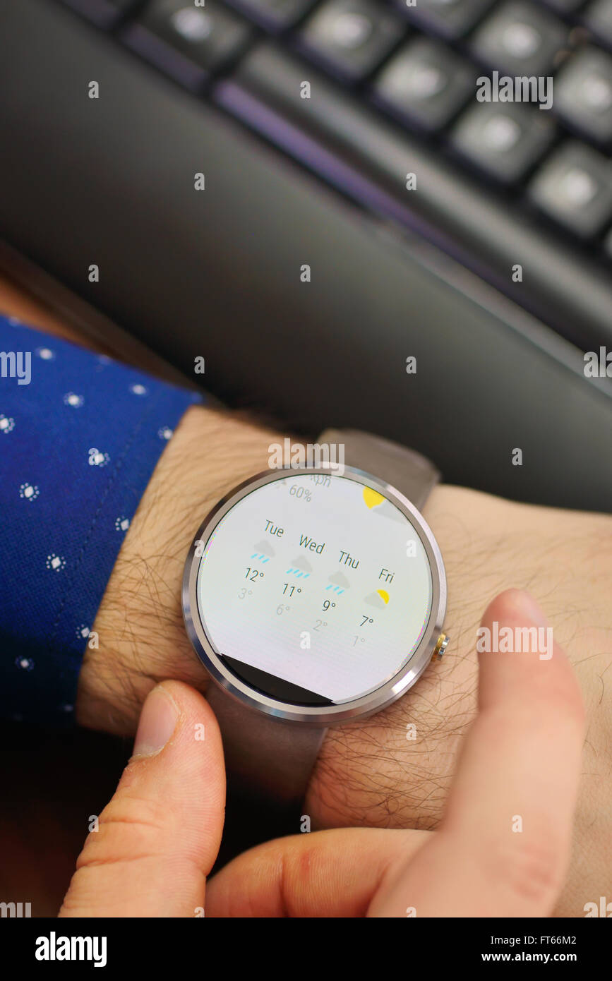 Search weather on smart watch Stock Photo