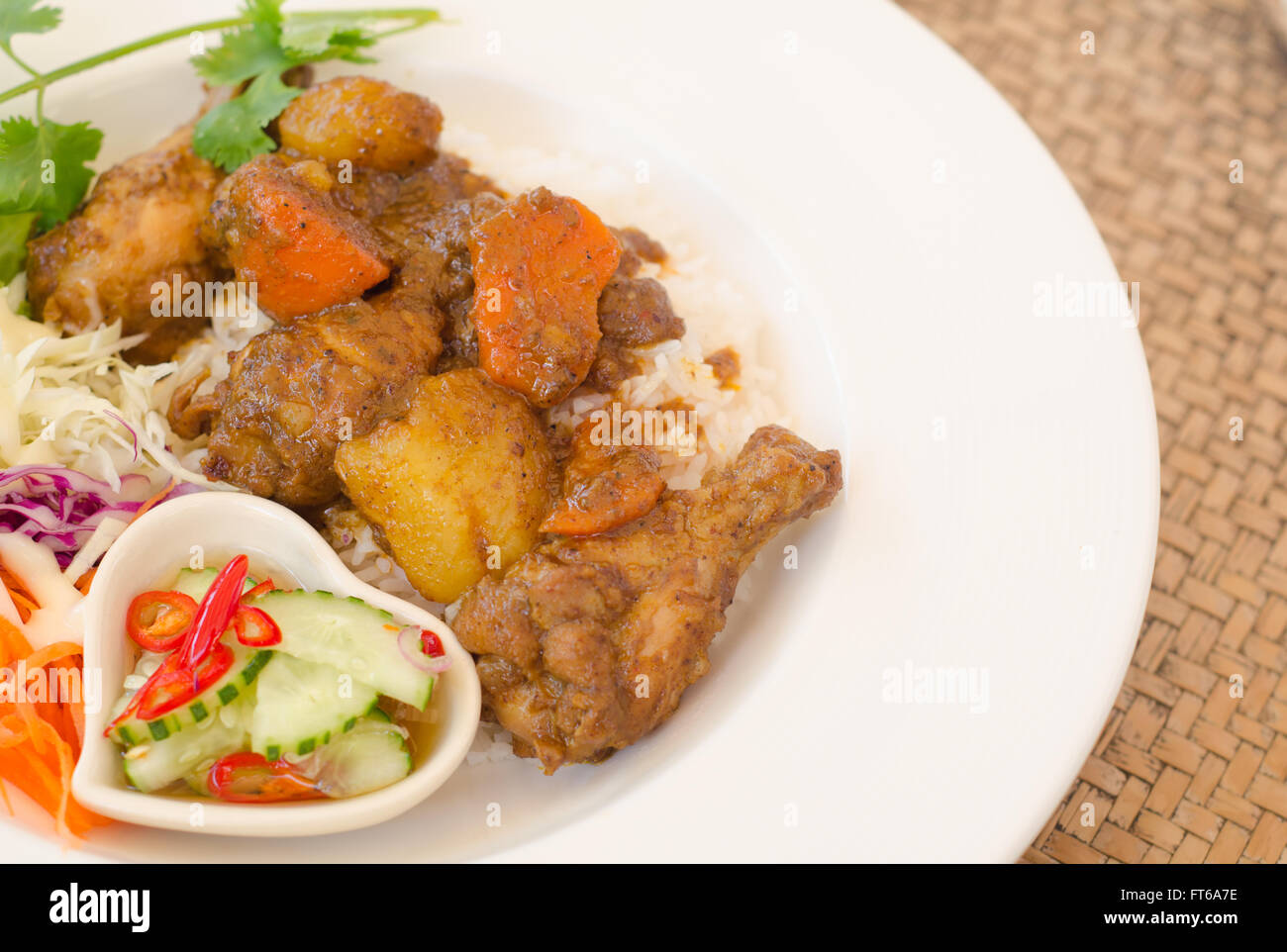 Massaman Curry Chicken and Rice Stock Photo