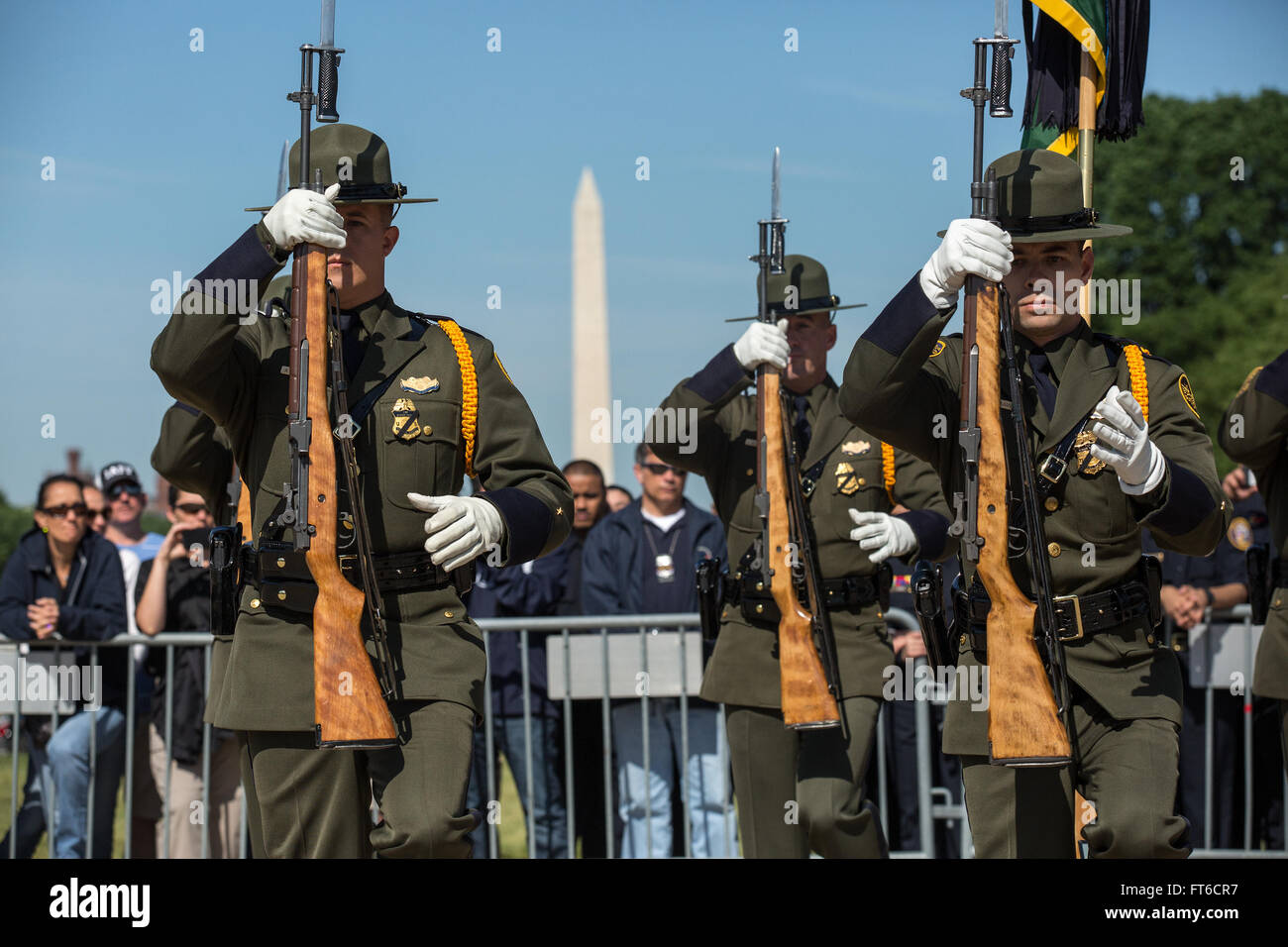 This photo captures the 13th Annual Steve Young Honor Guard Competition held during Police Week in Washington, DC. The competition featured teams from Border Patrol, the Office of Field Operations, and the Office of Air and Marine, showcasing law enforcement skills. Stock Photo