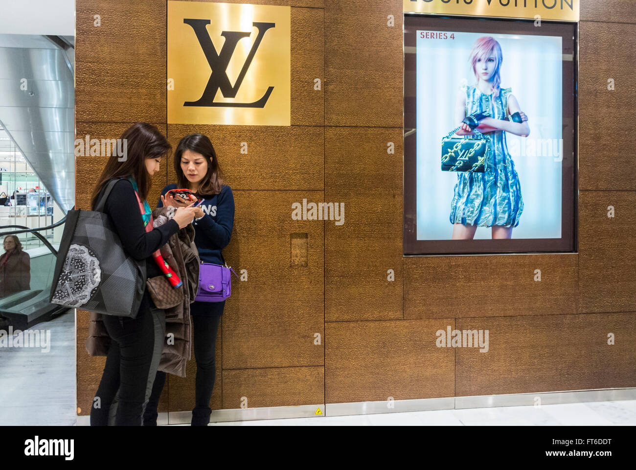 Paris, France, Woman Carrying Louis Vuitton Shopping Bags on Street,  Avenue Montaigne, mode labels, centre fashion Stock Photo - Alamy