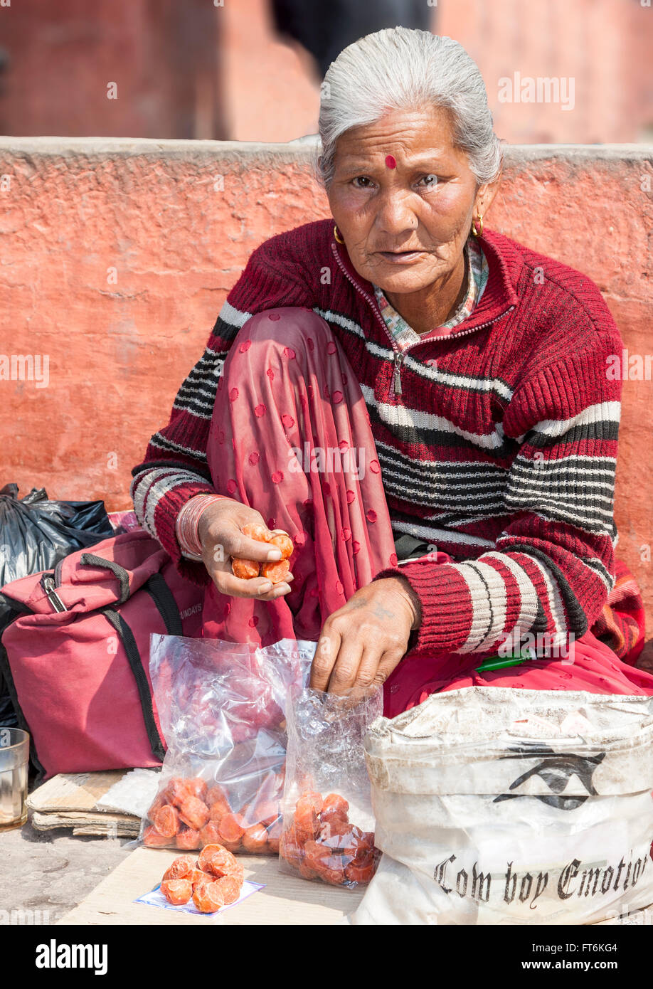 Nepal, Kathmandu.  Woman Vendor in Durbar Square. Stock Photo