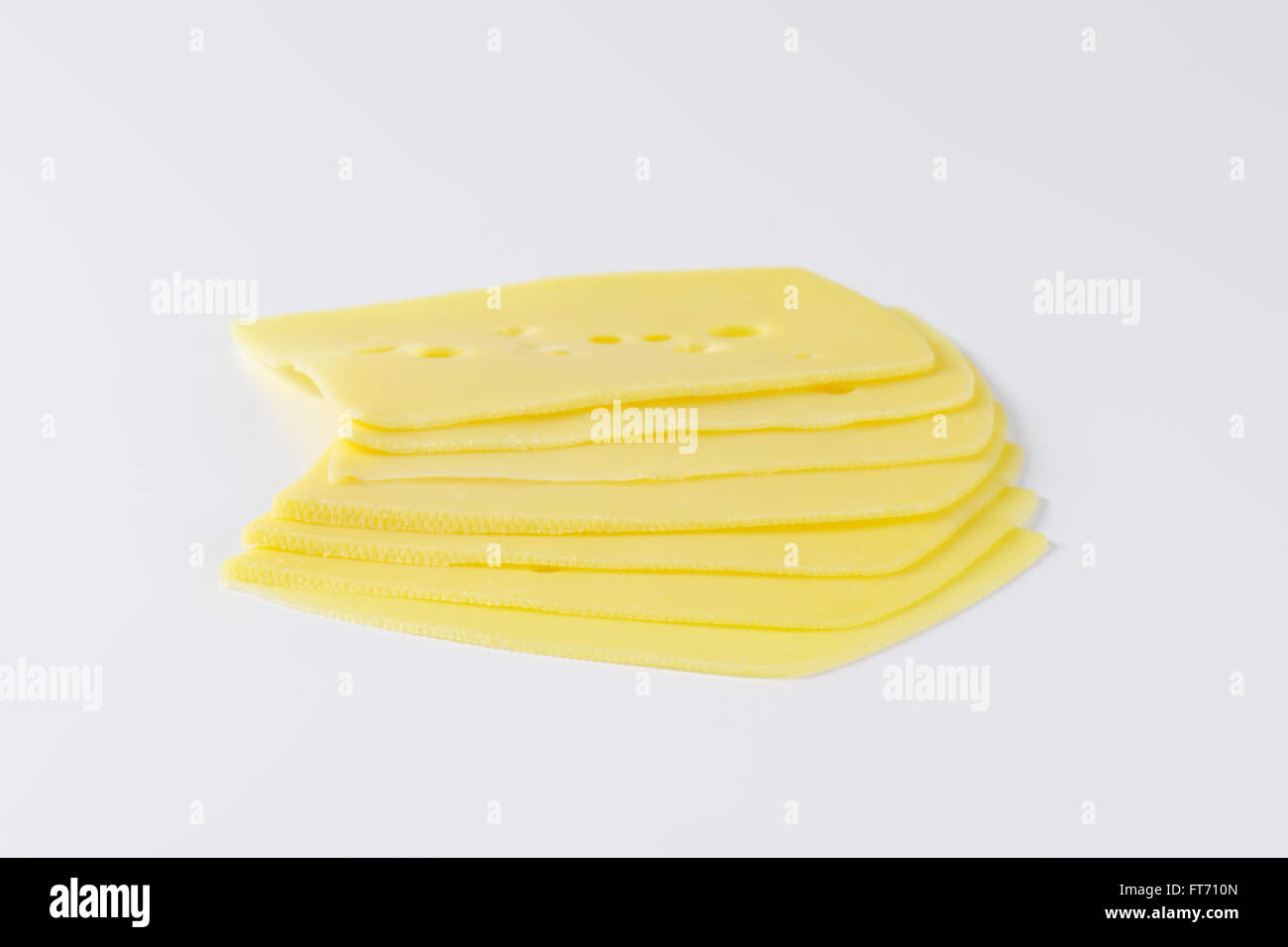 thin slices of emmental cheese Stock Photo