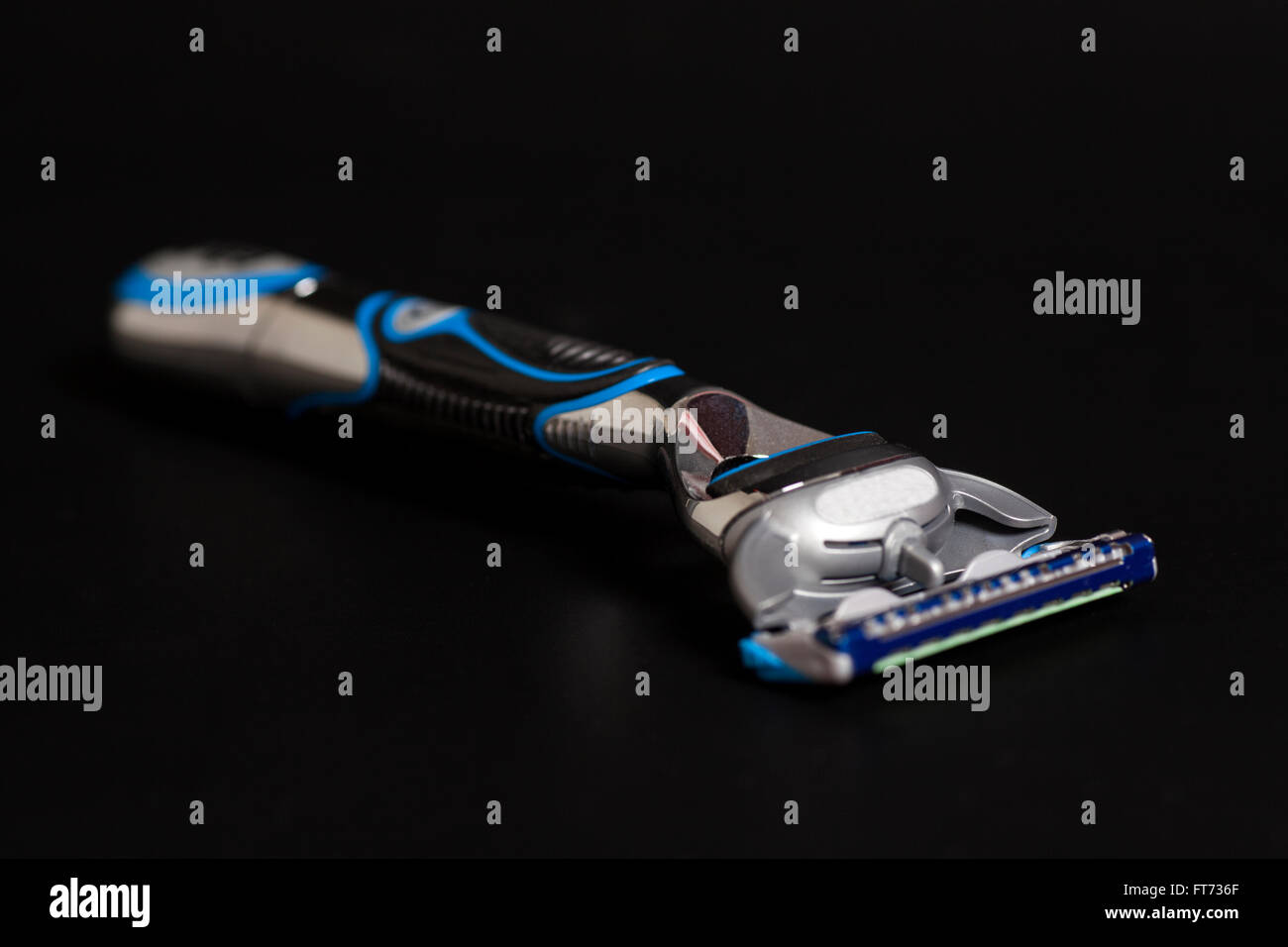 Safety razor on black background Stock Photo - Alamy