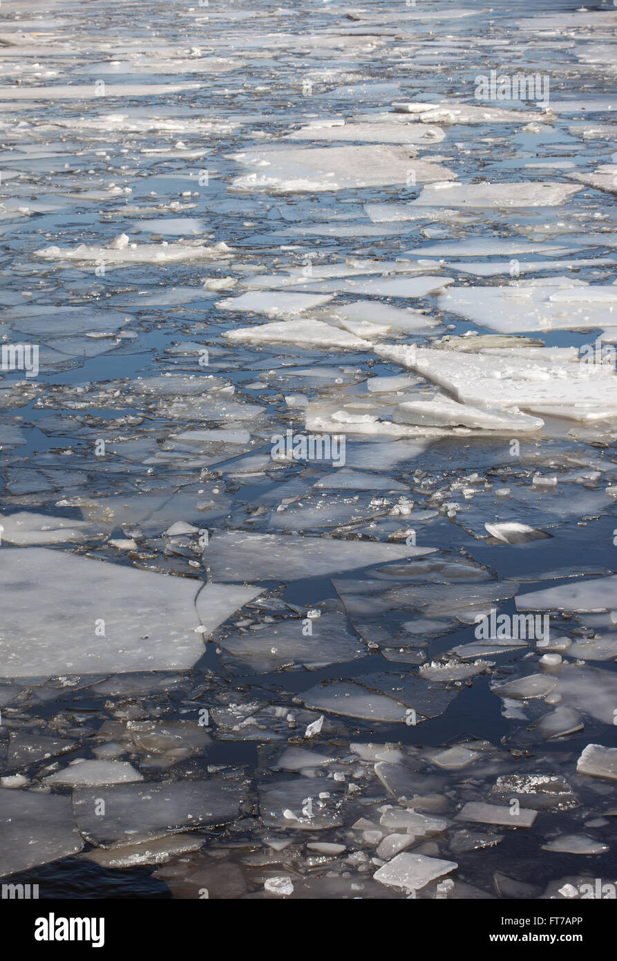 chunks of ice in the river background Stock Photo - Alamy