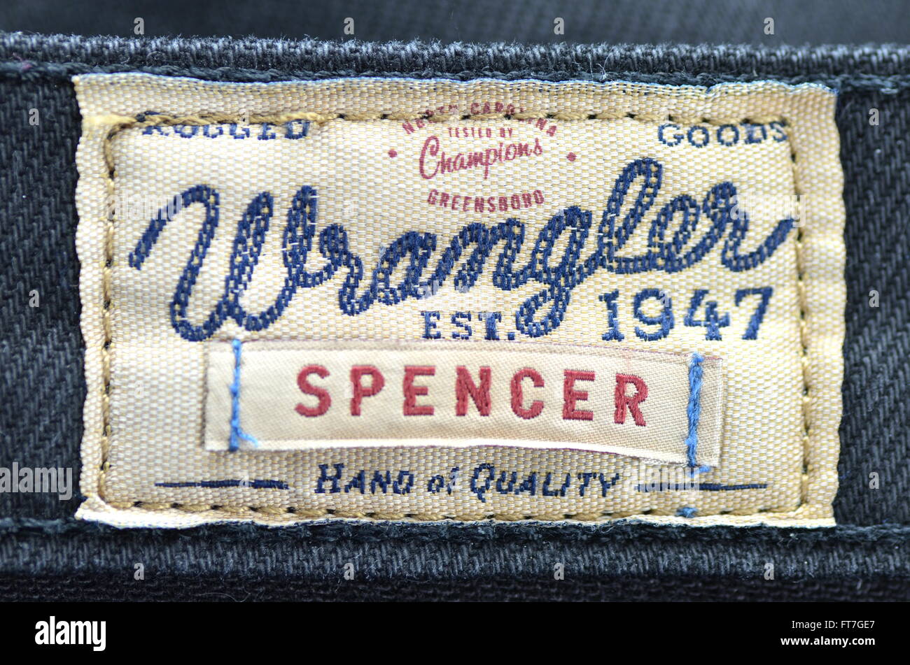 Closeup of Wrangler label on blue jeans Stock Photo - Alamy