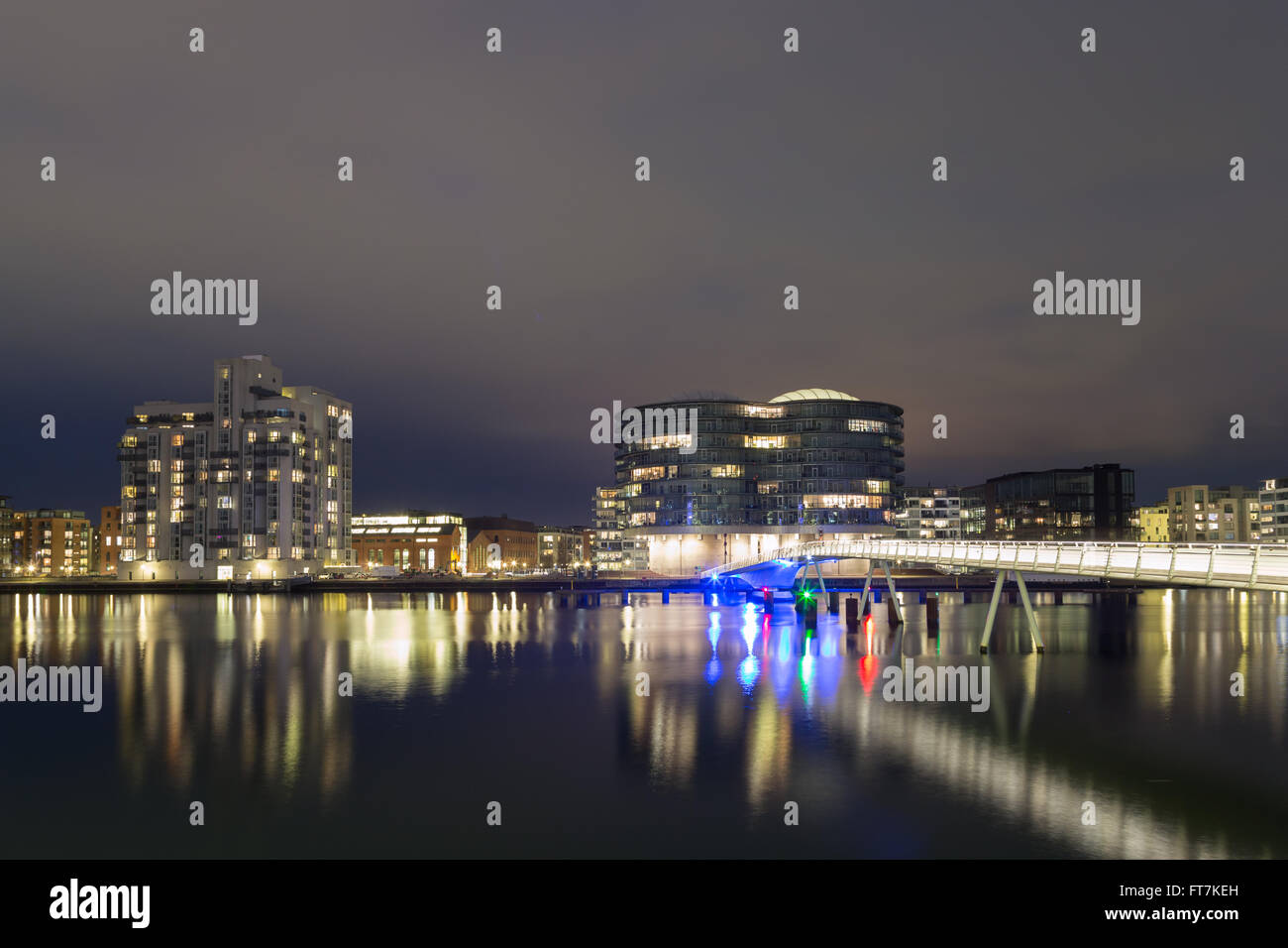 Copenhagen, Denmark - March 22, 2016: Modern cyclist and pedestrian bridge Bryggebroen and Gemini residence by night Stock Photo